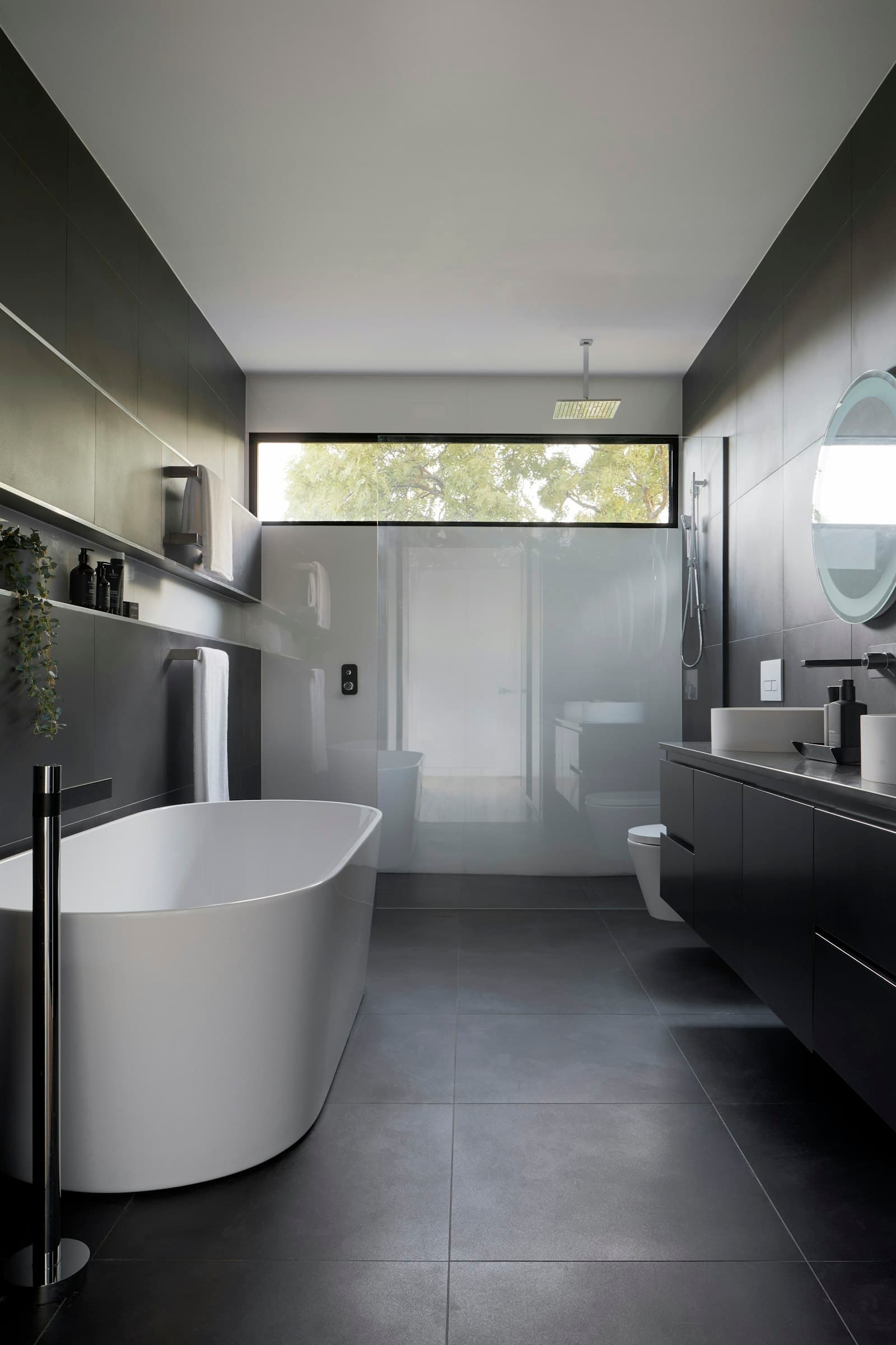 Walk-in rain shower with large-format tile